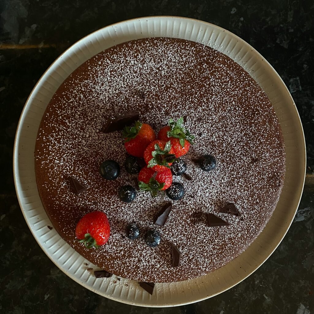 Authentic Vegan Tiramisu Cake with strawberries and blueberries - Vegan Cakes Atelier Thanisandra Bangalore