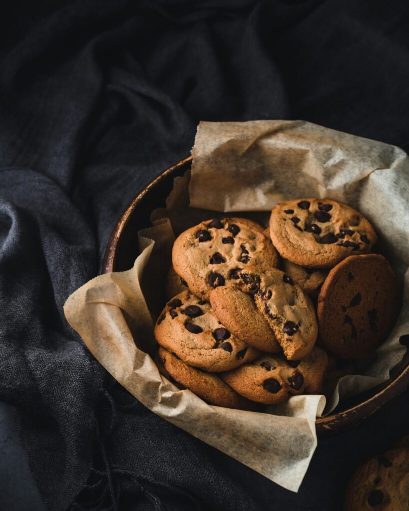 Gooey Chocolate Chip Classic Cookies in a rustic basket - Vegan Cakes Atelier Thanisandra Bangalore