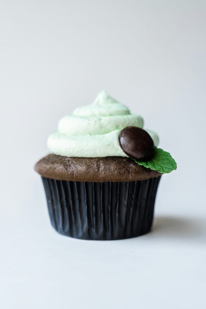 Matcha Vanilla Cupcake with mint frosting and chocolate disc - Vegan Cakes Atelier Thanisandra Bangalore
